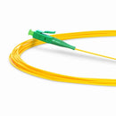 Close up of Lightwave LC APC connector and 900um tight-buffered multimode fiber strand