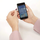 SanDisk Ultra 128GB microSDXC memory card inserted into smartphone in Nairobi Kenya
