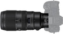 Side view of Nikon NIKKOR Z 100-400mm f/4.5-5.6 VR S super-telephoto zoom lens attached to a full-frame Nikon Z9 mirrorless camera body