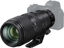 Angled view of Nikon NIKKOR Z 100-400mm f/4.5-5.6 VR S lens mounted on a Nikon Z6 II camera showing the 77mm front lens element and tripod foot