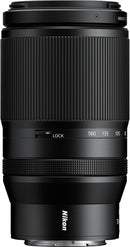 Close-up side profile of the compact Nikon NIKKOR Z 70-180mm f/2.8 constant aperture lens showing the zoom lock button and textured grip rings