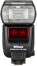 Direct front view of the Nikon SB-5000 Speedlight showing the main flash tube diffuser and red AF-assist illuminator panel