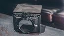 Tilta Mini Matte Box MB-T15 standing on a table showing 77mm adapter ring